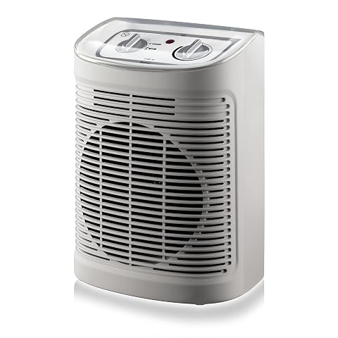 Radiateur soufflant mobile gris clair et blanc posé dans une salle de bain contemporaine lumineuse